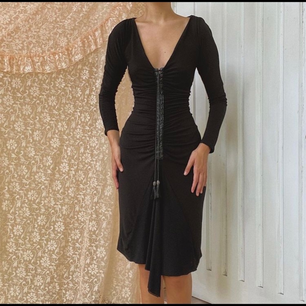 Black dress with leather tassels